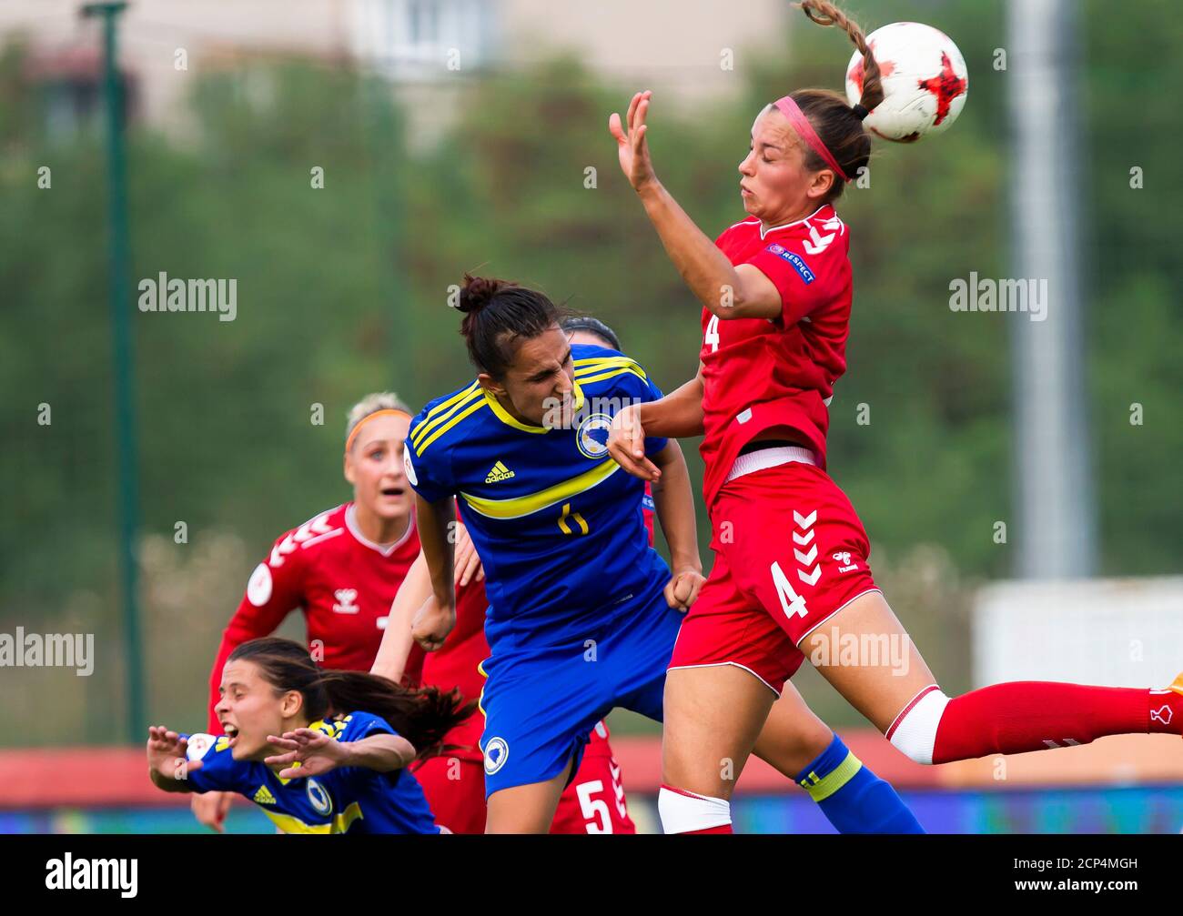 ZENICA, BOSNIA AND HERZEGOVINA - SEPTEMBER 17:  Sevecke of Denmark competes in the air duel during the UEFA Women's Euro Qualifying match between Bosnia and Herzegovina v Denmark at FF BH Football Training Centre on September 17, 2020 in Belgrade, Serbia. (Photo by Nikola Krstic/MB Media/Getty Images) Stock Photo