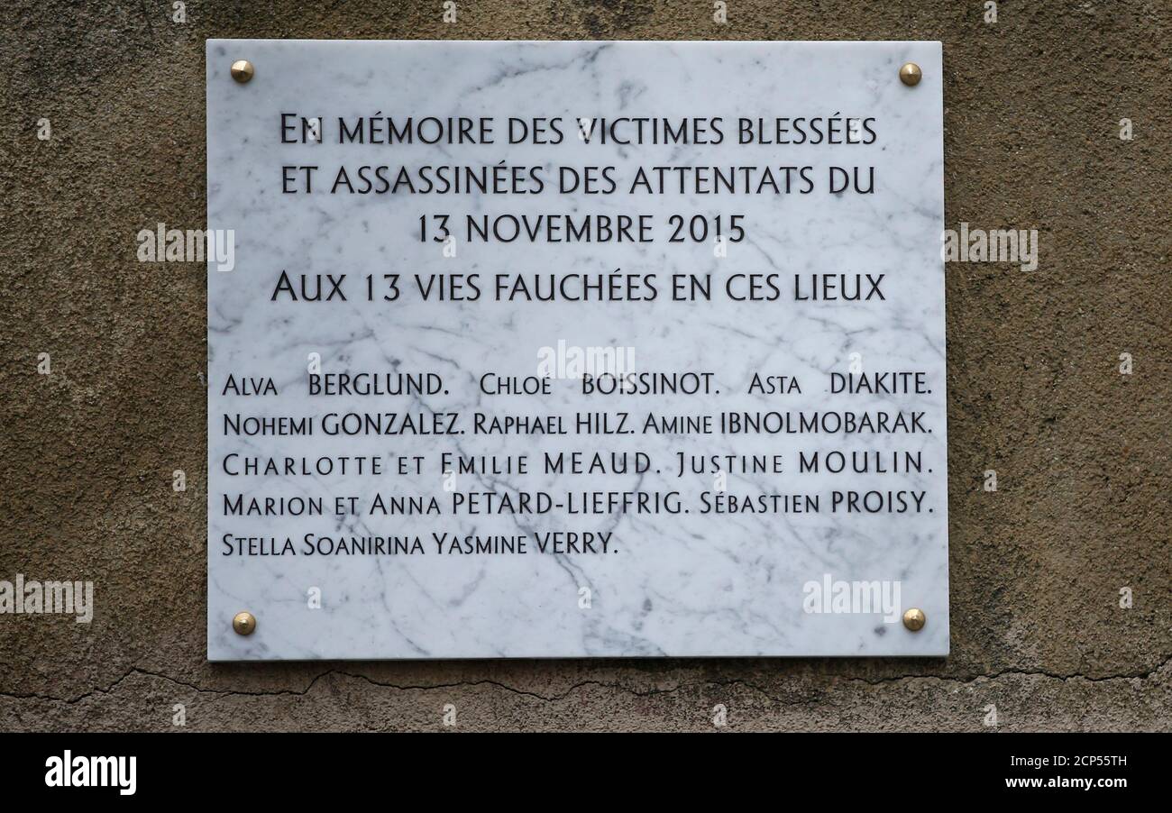 A commemorative plaque unveiled by French President Francois Hollande and Paris Mayor Anne Hidalgo is seen next to the 'Le Carillon' and 'Le Petit Cambodge' bars and restaurants, in Paris, France, November 13, 2016, during a ceremony held for the victims of last year's Paris attacks which targeted the Bataclan concert hall as well as a series of bars and killed 130 people.   REUTERS/Gonzalo Fuentes Stock Photo