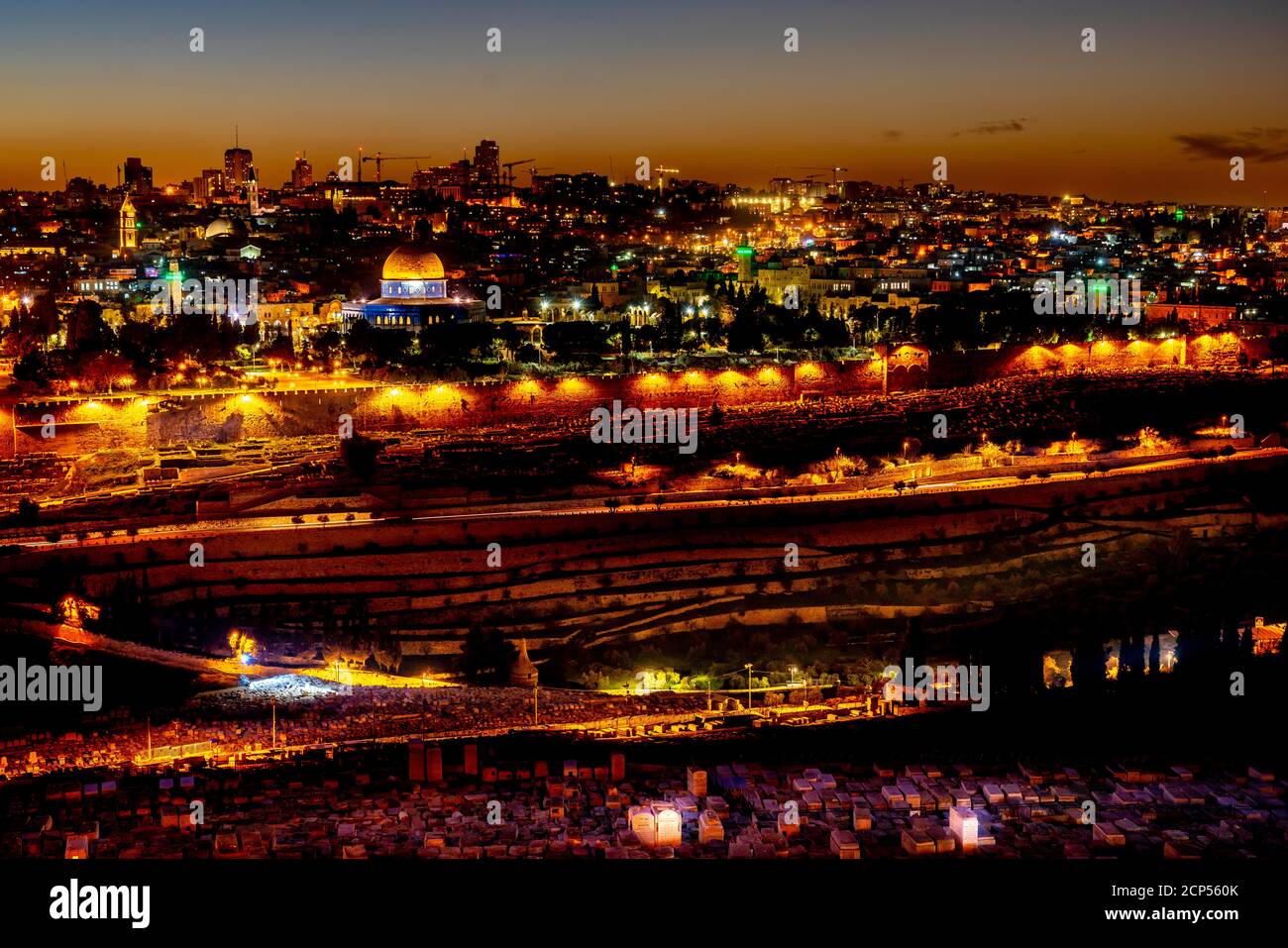 The city skyline illuminated at night from the Mount of Olives, Jerusalem, Israel, Middle East. Stock Photo