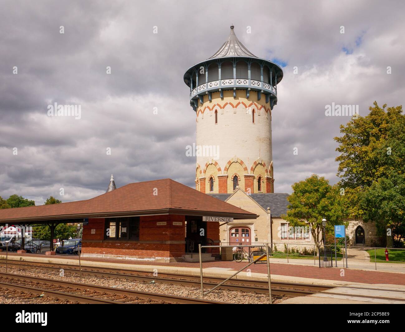 Metra commuter rail station and vintage water tower and water works now housing historical society. Riverside, Illinois. Stock Photo
