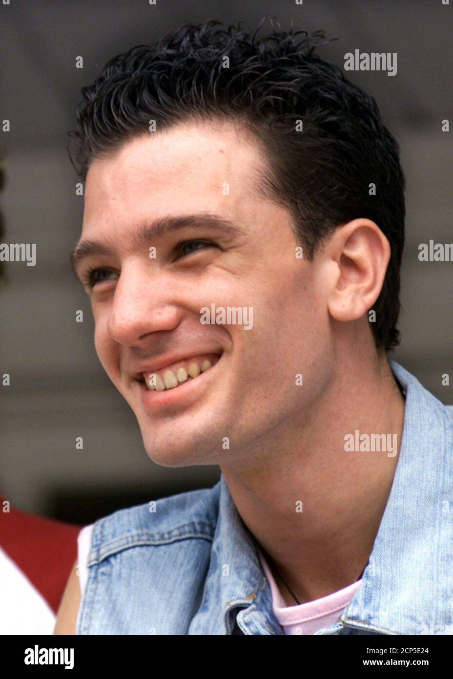 JC Chasez, a member of the pop group 'N'Sync,' is shown at the Ronald McDonald House in Orlando, Florida August 16, 2000. The Ronald McDonald house serves as a home-away-from-home for families of critically ill children being treated at nearby medical centers.  JOE SKIPPER Stock Photo