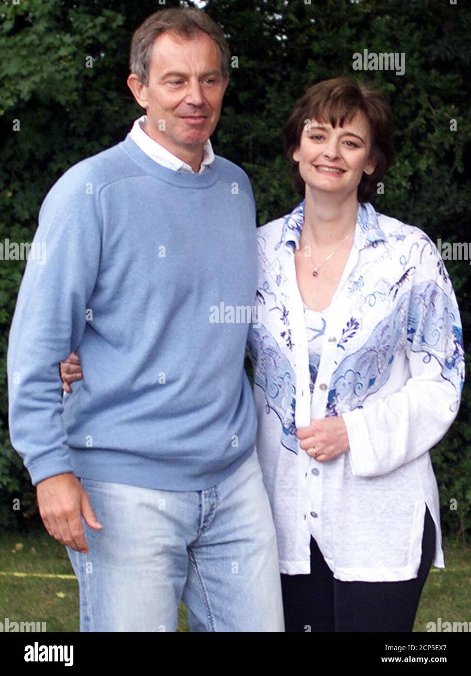 British prime Minister Tony Blair and his wife Cherie pose at Lagrezette chateau in Caillac, southwestern France, August 12, 2002. REUTERS/Jean-Philippe Arles  JPA/CRB Stock Photo
