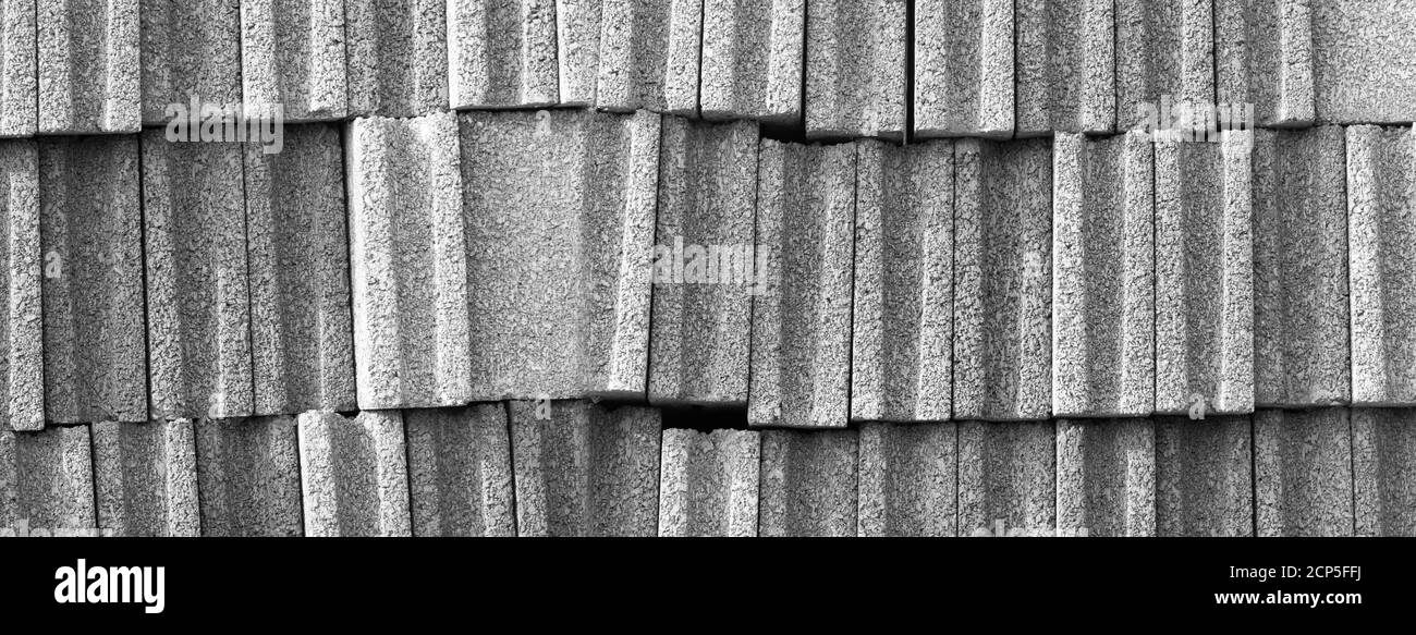 texture of dark grey concrete block material architecture banner background Stock Photo
