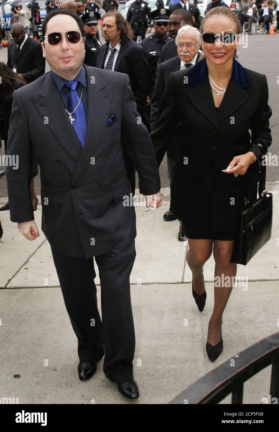 Producer David Gest L Arrives With Frida Paine At The Memorial Service For Musician Ray Charles At The First African Methodist Episcopal Church In Los Angeles June 18 2004 Charles Who Overcame