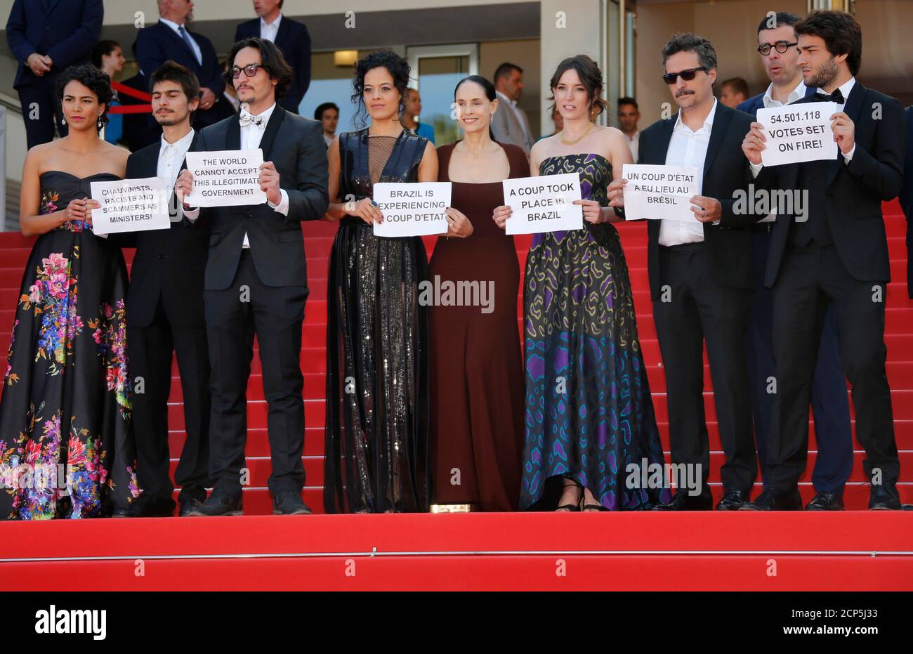 Director Kleber Mendonca Filho 3rdr And Cast Members Maeve Jinkings 4thl Sonia Braga C Barbara Colen L Producer Emilie Lesclaux 4thr And Team Hold Placards To Protest Against The Impeachment Of Suspended
