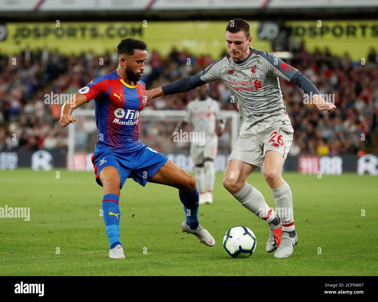 Soccer Football - Premier League - Crystal Palace v Liverpool - Selhurst Park, London, Britain - August 20, 2018  Liverpool's Andrew Robertson in action with Crystal Palace's Andros Townsend                  Action Images via Reuters/John Sibley  EDITORIAL USE ONLY. No use with unauthorized audio, video, data, fixture lists, club/league logos or 'live' services. Online in-match use limited to 75 images, no video emulation. No use in betting, games or single club/league/player publications.  Please contact your account representative for further details. Stock Photo