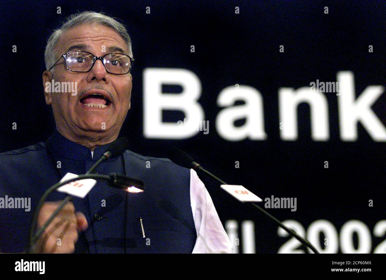 Indian Finance Minister Yashwant Sinha speaks during the inaugural session of 'Banking Summit 2002' organised by the Confederation of Indian Industries (CII) in Bombay April 1, 2002. Sinha expressed his optimism about the Indian economy expecting an upswing and also said that he expects the interest rates to stay soft. REUTERS/Arko Datta  AD/CP Stock Photo