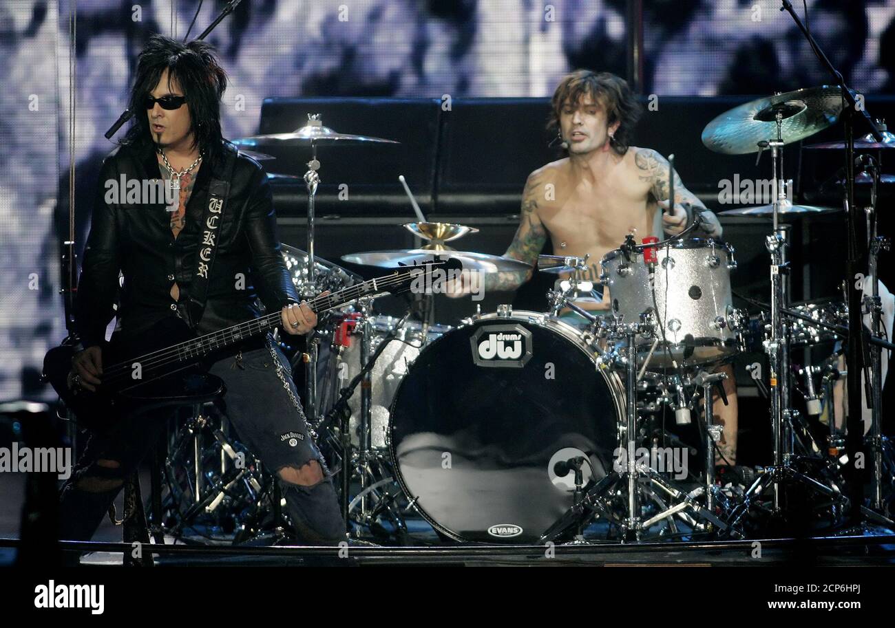 Guitarist Nikki Sixx (L) and drummer Tommy Lee of the group Motley Crue  perform live for the first time in years, at the Spike TV Video Game Awards  in Santa Monica, California,