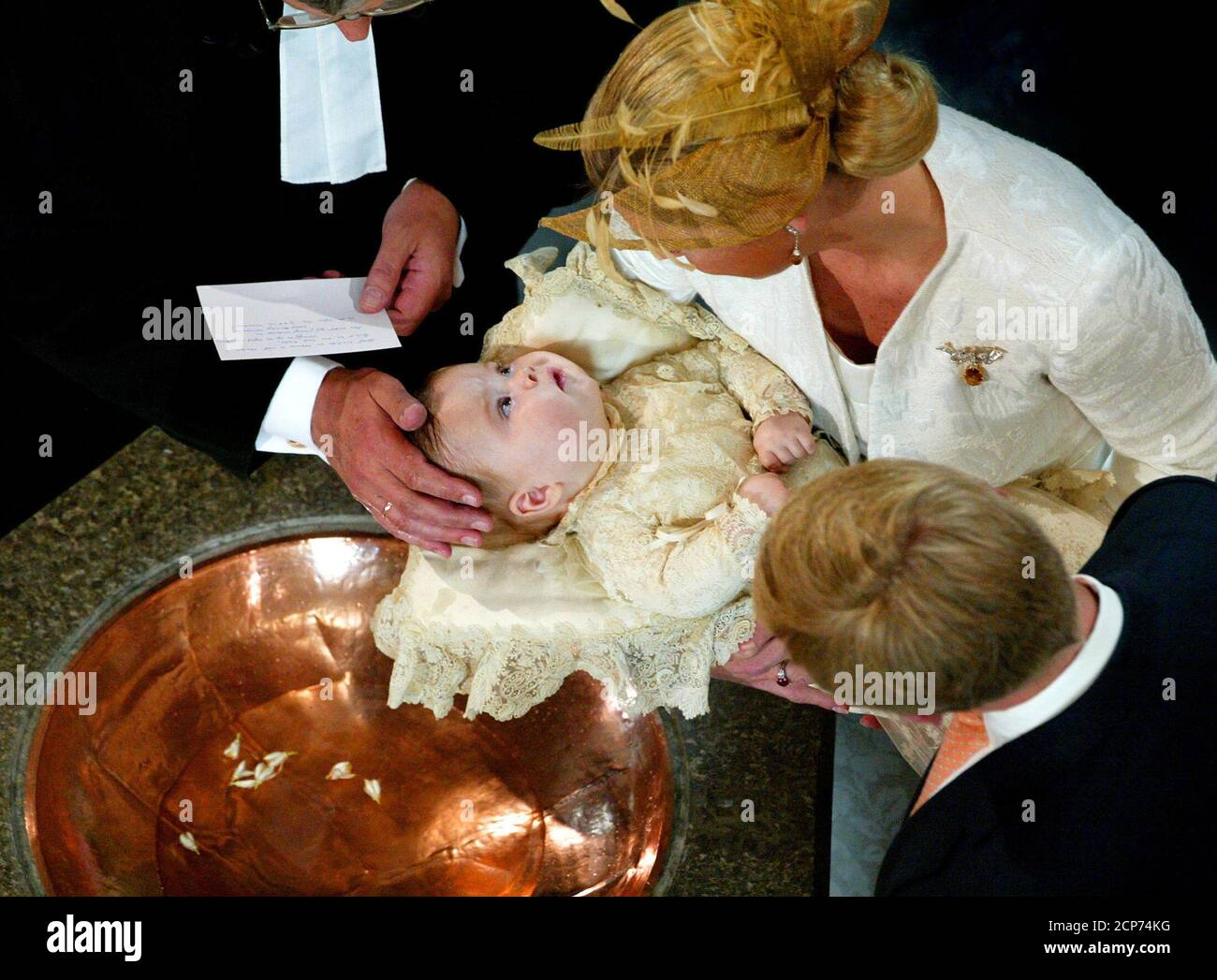 Reverend Carel Ter Linde L Christenens Princess Catharina Amalia The Baby Daughter Of Crown Prince Willem Alexander R And Princess Maxima M In The Grote Of St Jacobskerk In The Hague June 12