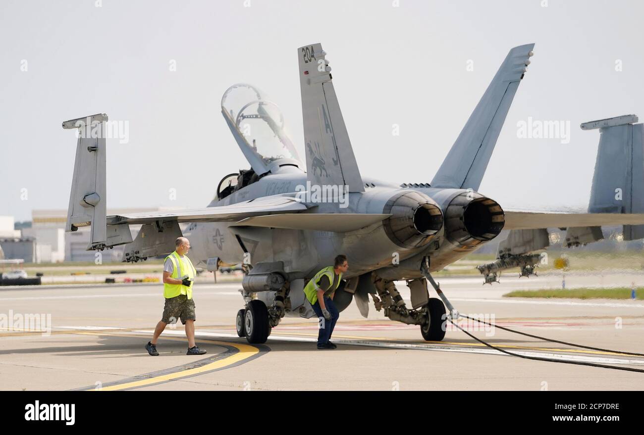 St. Louis, United States. 18th Sep, 2020. Boeing technicians prepare to move a F-18 military jet off of the taxiway, that has made an emergency landing at St. Louis-Lambert International Airport in St. Louis on Friday, September 18, 2020. Photo by Bill Greenblatt/UPI Credit: UPI/Alamy Live News Stock Photo