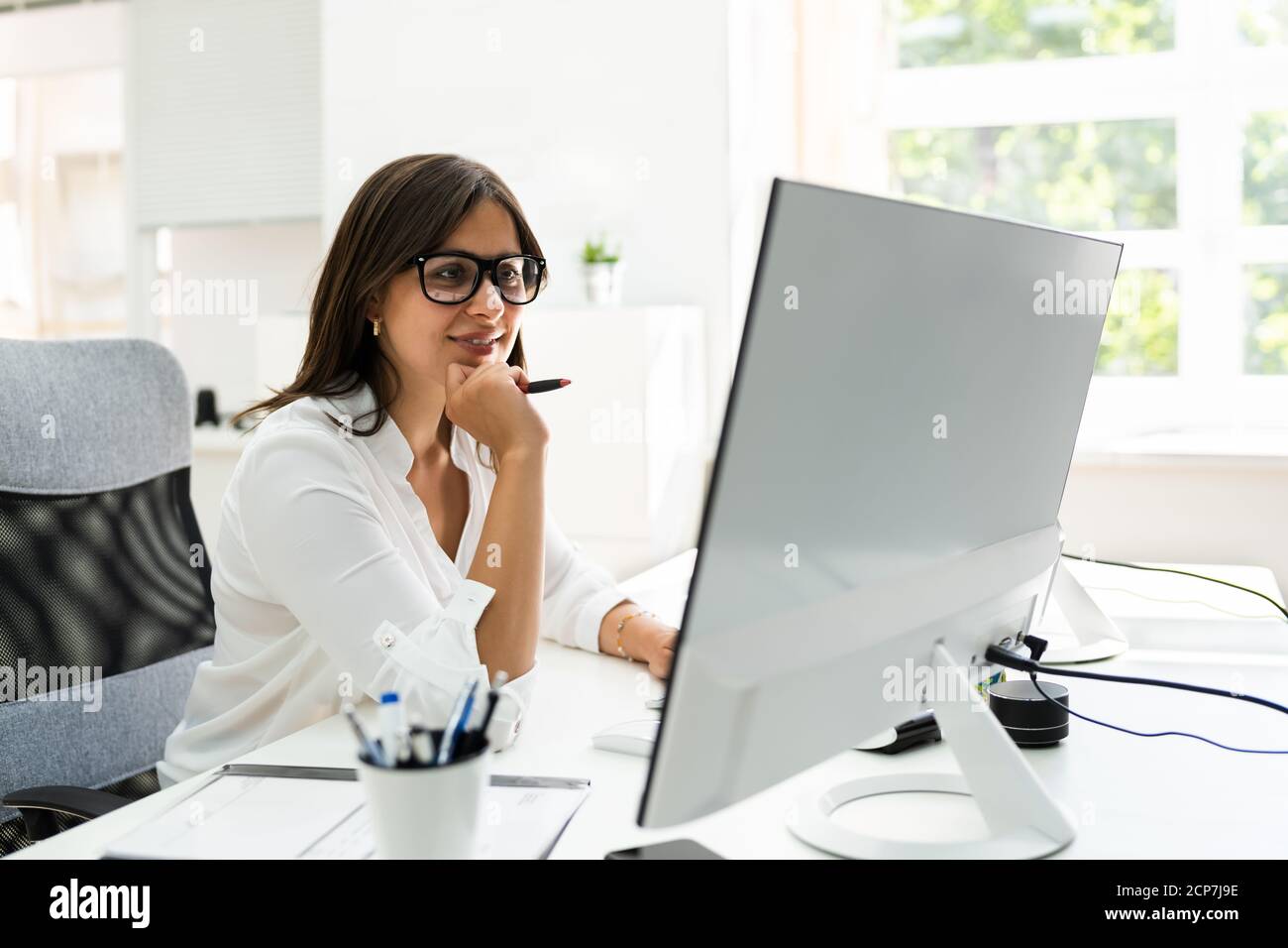 Business Executive Woman Working On Corporate Computer Stock Photo