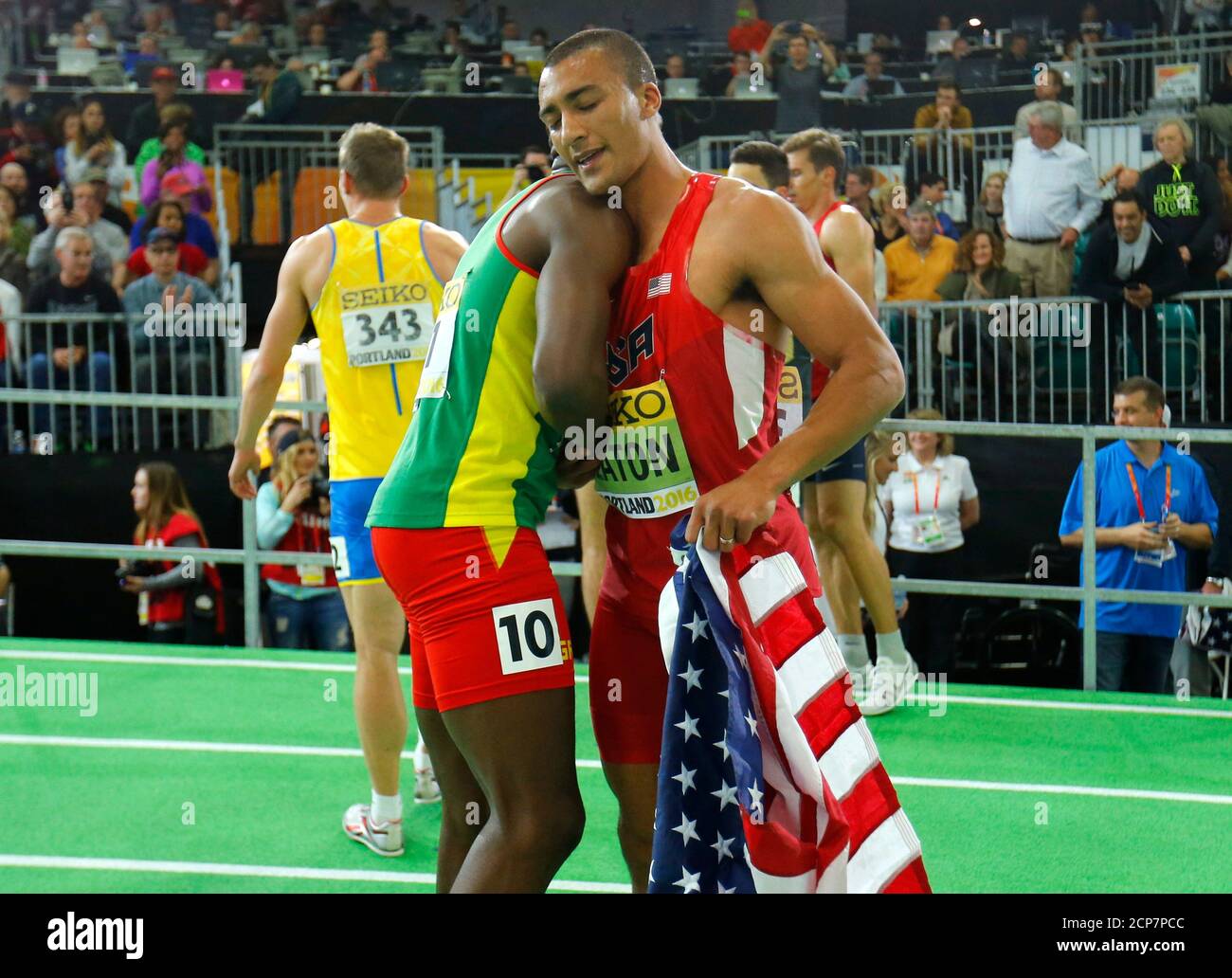 Gold medalist Ashton Easton of the U.S. (R) is embraced by Kurt Felix of Grenada after the men's heptathlon during the IAAF World Indoor Athletics Championships in Portland, Oregon March 19, 2016. REUTERS/Mike Blake Stock Photo
