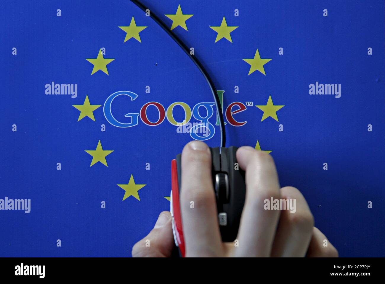 A woman hovers a mouse over the Google and European Union logos in this April 15, 2015 photo illustration.  This logo has been updated and is no longer in use.   REUTERS/Dado Ruvic/Illustration/File Photo     TPX IMAGES OF THE DAY Stock Photo