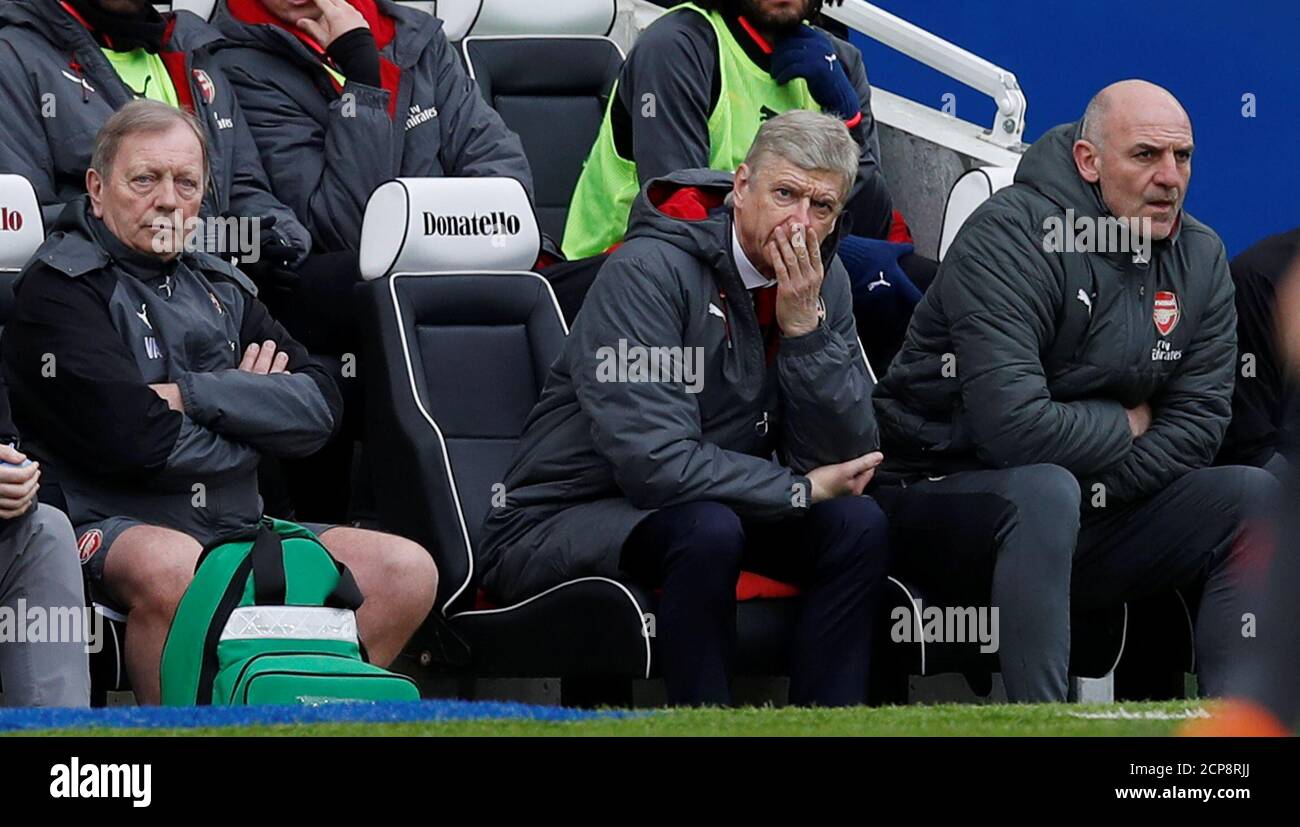 Soccer Football - Premier League - Brighton & Hove Albion vs Arsenal - The American Express Community Stadium, Brighton, Britain - March 4, 2018   Arsenal manager Arsene Wenger and assistant manager Steve Bould look dejected    REUTERS/Eddie Keogh    EDITORIAL USE ONLY. No use with unauthorized audio, video, data, fixture lists, club/league logos or 'live' services. Online in-match use limited to 75 images, no video emulation. No use in betting, games or single club/league/player publications.  Please contact your account representative for further details. Stock Photo