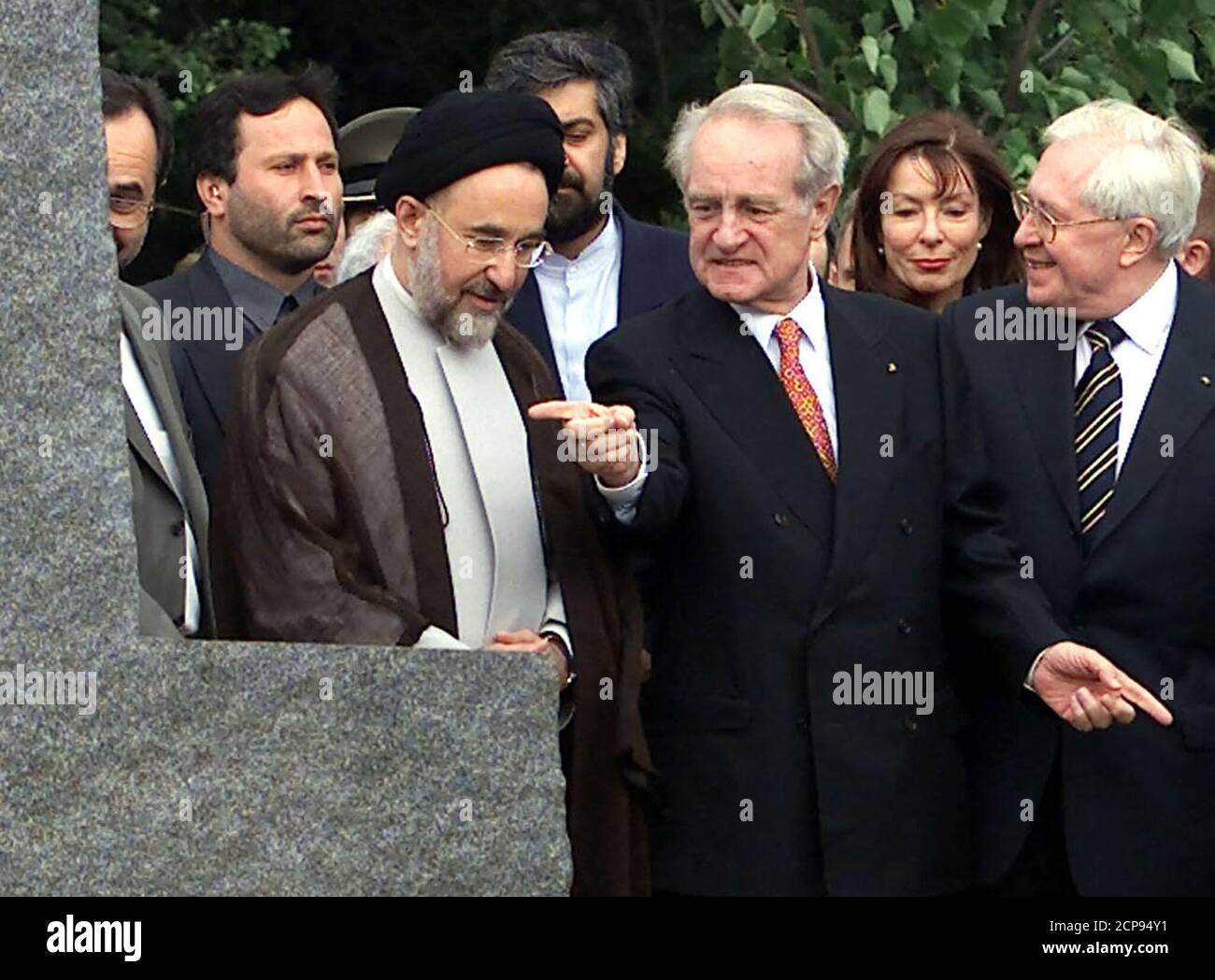 Iran's reformist President Mohammad Khatami (2ndL) listens to German President Johannes Rau who makes a point when they visit a memorial for 14th century Persian poet Hafez and Germany's greatest writer Johann Wolfgang von Goethe in Weimar, July 12. Khatami continues his official three day visit to Germany.  KP Stock Photo