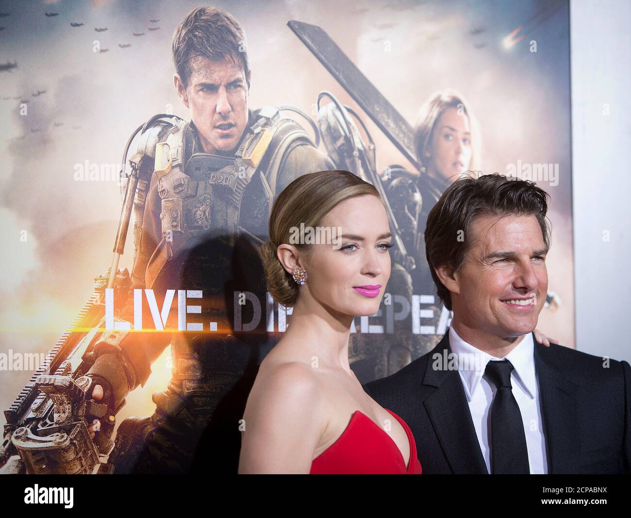 Cast members Emily Blunt and Tom Cruise arrive for the premiere of "Edge of  Tomorrow" in New York May 28, 2014. The movie premiered in three countries  in one day. REUTERS/Carlo Allegri (