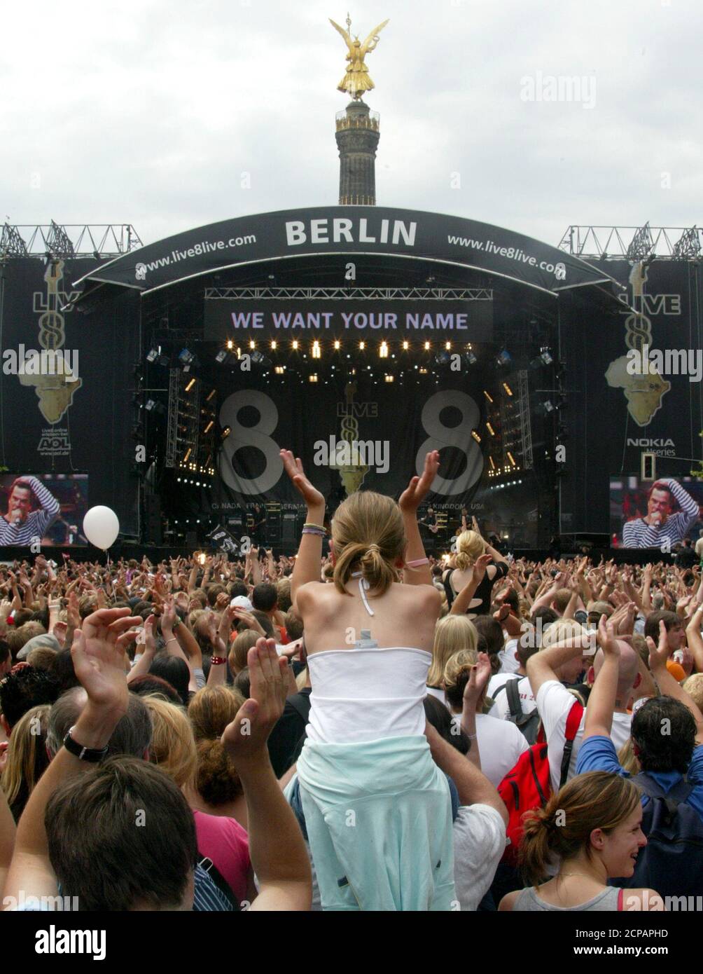 German band 'Die Toten Hosen' performs during the Live 8 concert in front  of the Victory column in Berlin. The crowd cheers as German band 'Die Toten  Hosen' performs during the Live