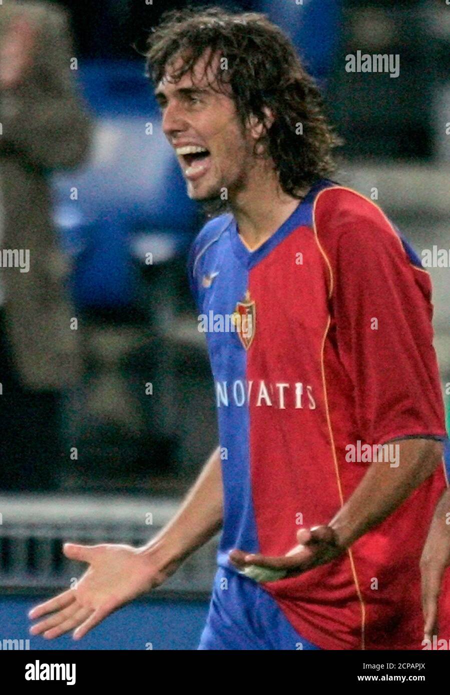 Basel's Matias Emilio Delgado celebrates after scoring against Siroki  Brijeg during their UEFA Cup first round first leg soccer match at the St.  Jakob-Park stadium in Basel, Switzerland, September 15, 2005..  REUTERS/Pascal