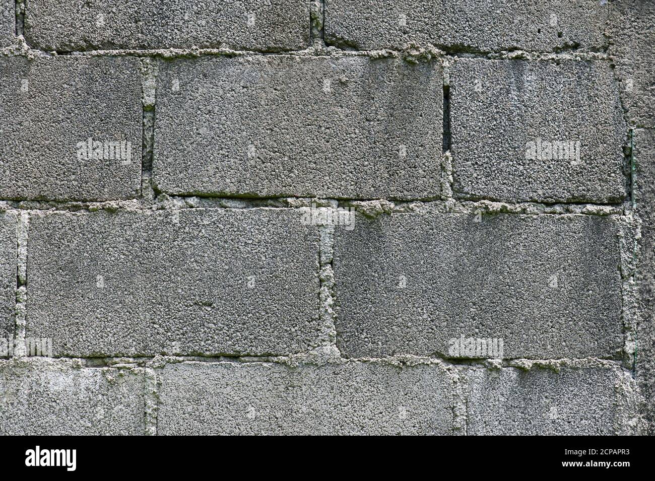 Gray stone brick wall background macro close up view Stock Photo
