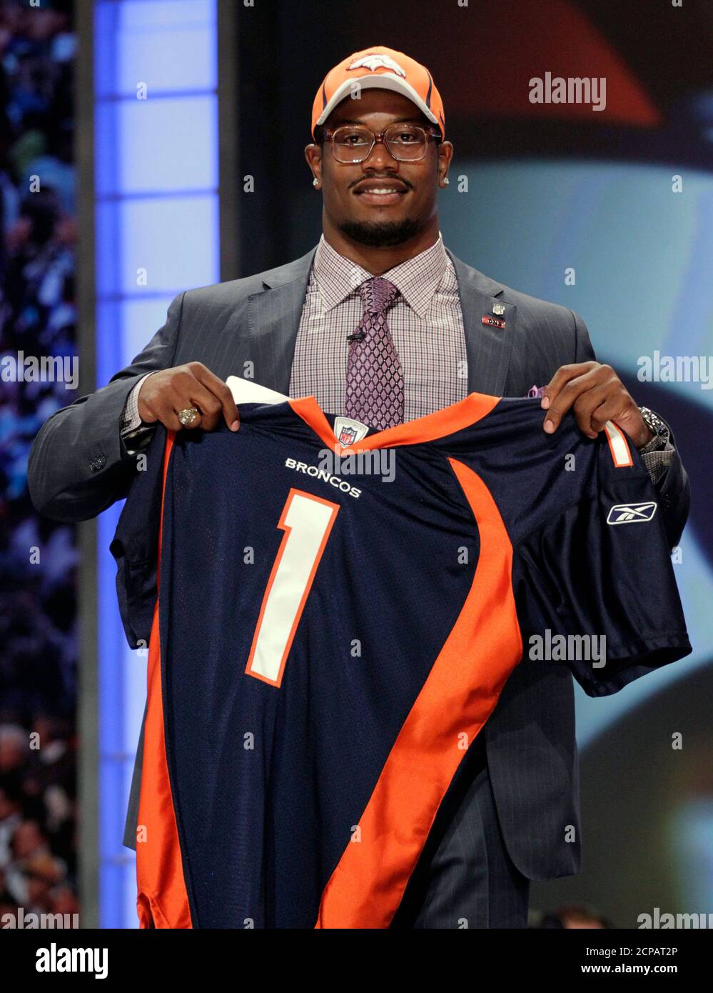 Linebacker Von Miller of Texas A&M University holds up a jersey after being  selected as the second overall pick by the Denver Broncos in the 2011 NFL  football Draft in New York,