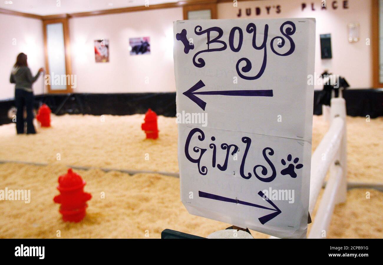 A sign is seen inside the Hotel Pennsylvania marking where dogs can go to the bathroom in New York February 11, 2011.The 135th Westminster Kennel Club Dog Show  will run from February 14-15th and will extend its reign as the United States' second longest continuously held sporting event, behind only the Kentucky Derby. REUTERS/Shannon Stapleton (UNITED STATES - Tags: SOCIETY) Stock Photo
