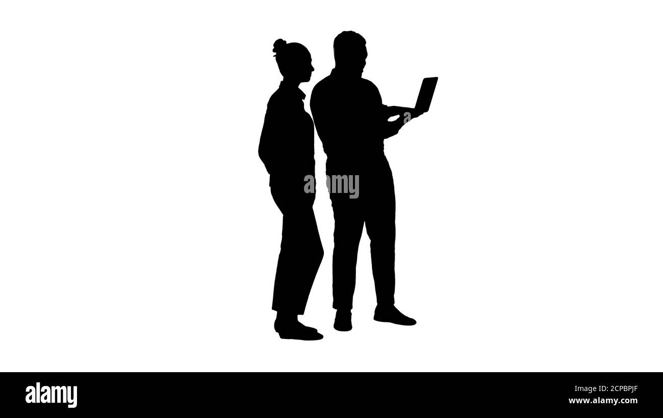 Silhouette Satisfied of their work man and woman looking in the Stock Photo