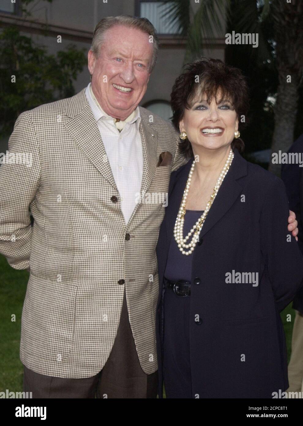 Actress Suzanne Pleshette, who stars in the television series "Good Morning  Miami", poses as she arrives with her husband Tom Poston at the NBC  All-Star Party held for the nation's TV critics