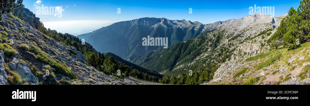 Panorama in Olympus mountain in Greece with the high peaks and the Enipeas Gorge in the morning Stock Photo