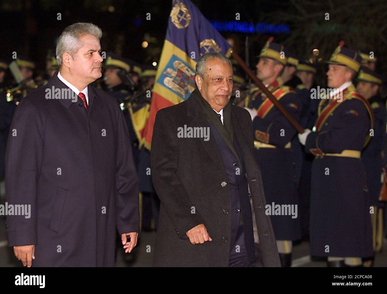 Romanian Prime Minister Adrian Nastase (L) and his Egyptian counterpart Atef  Ebeid (R) review a honour guard at Victoria palace in Bucharest December 3,  2003. Ebeid is in Romania on a two-day
