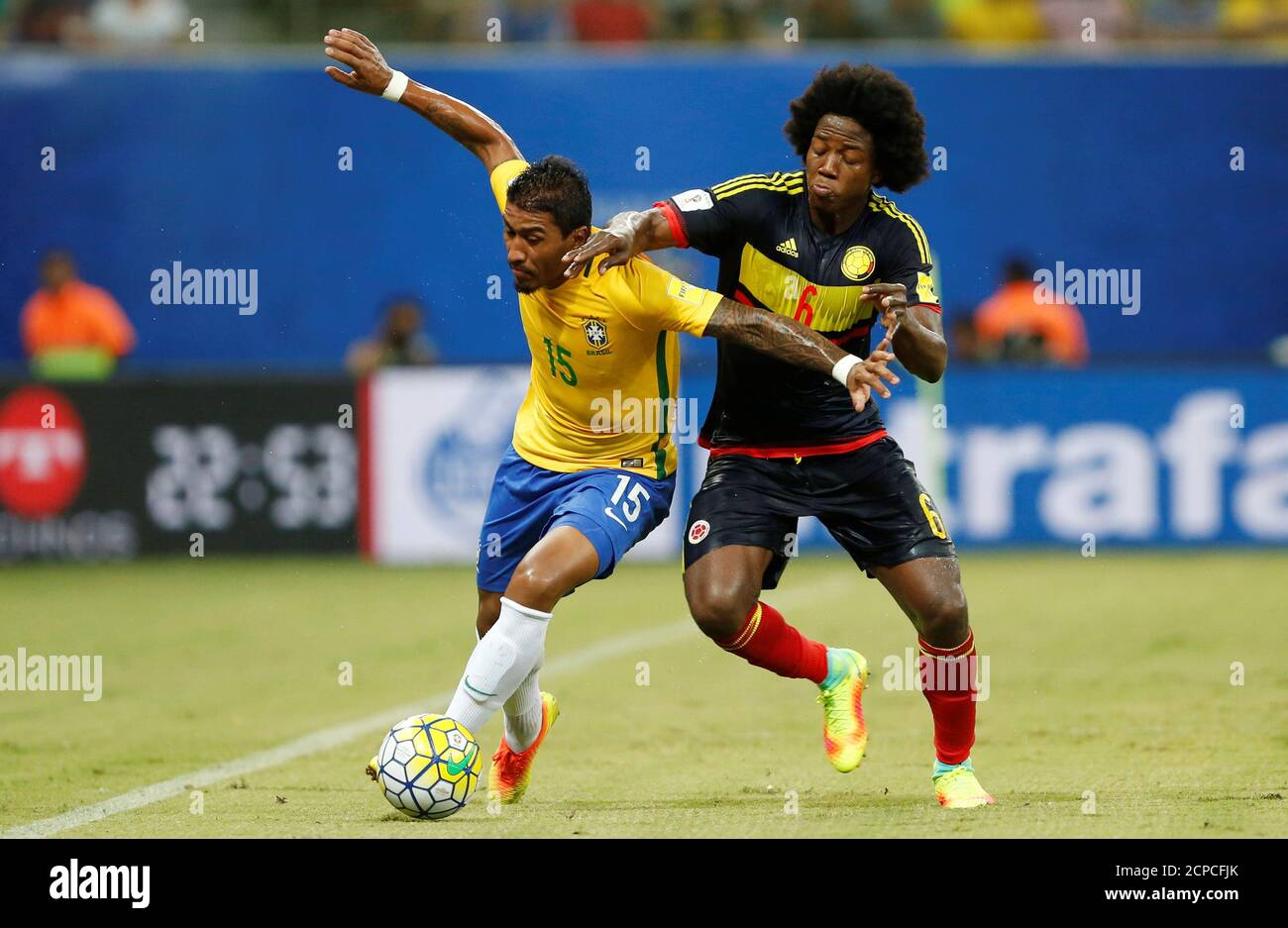 Football Soccer - World Cup 2018 Qualifiers - Brazil v Colombia - Amazonia Arena Stadium, Manaus, Brazil - 6/9/16. Paulinho (L) of Brazil in action with Carlos Sanchez of Colombia.   REUTERS/Bruno Kelly Stock Photo