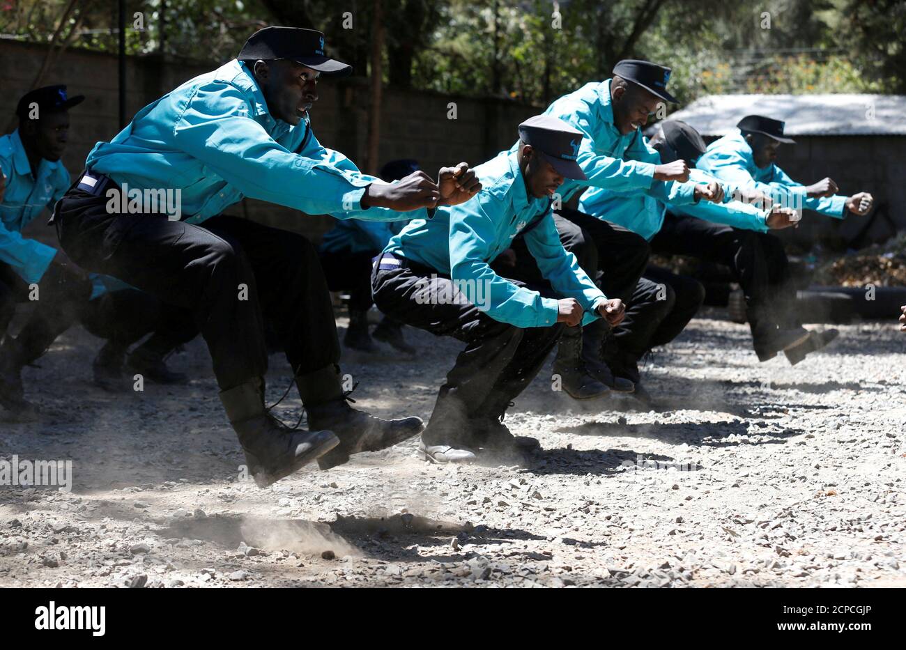 Kenyan security guards participate in physical exercise during martial arts combat training at the Chinese-run Deway Security Group compound in Kenya's capital Nairobi, March 13, 2017. REUTERS/Thomas Mukoya     TPX IMAGES OF THE DAY Stock Photo