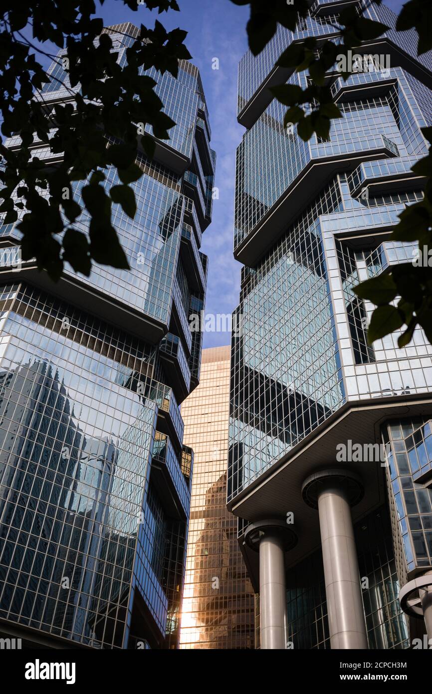 Glass facades with reflections, architecture in Admiralty, Hong Kong Stock Photo