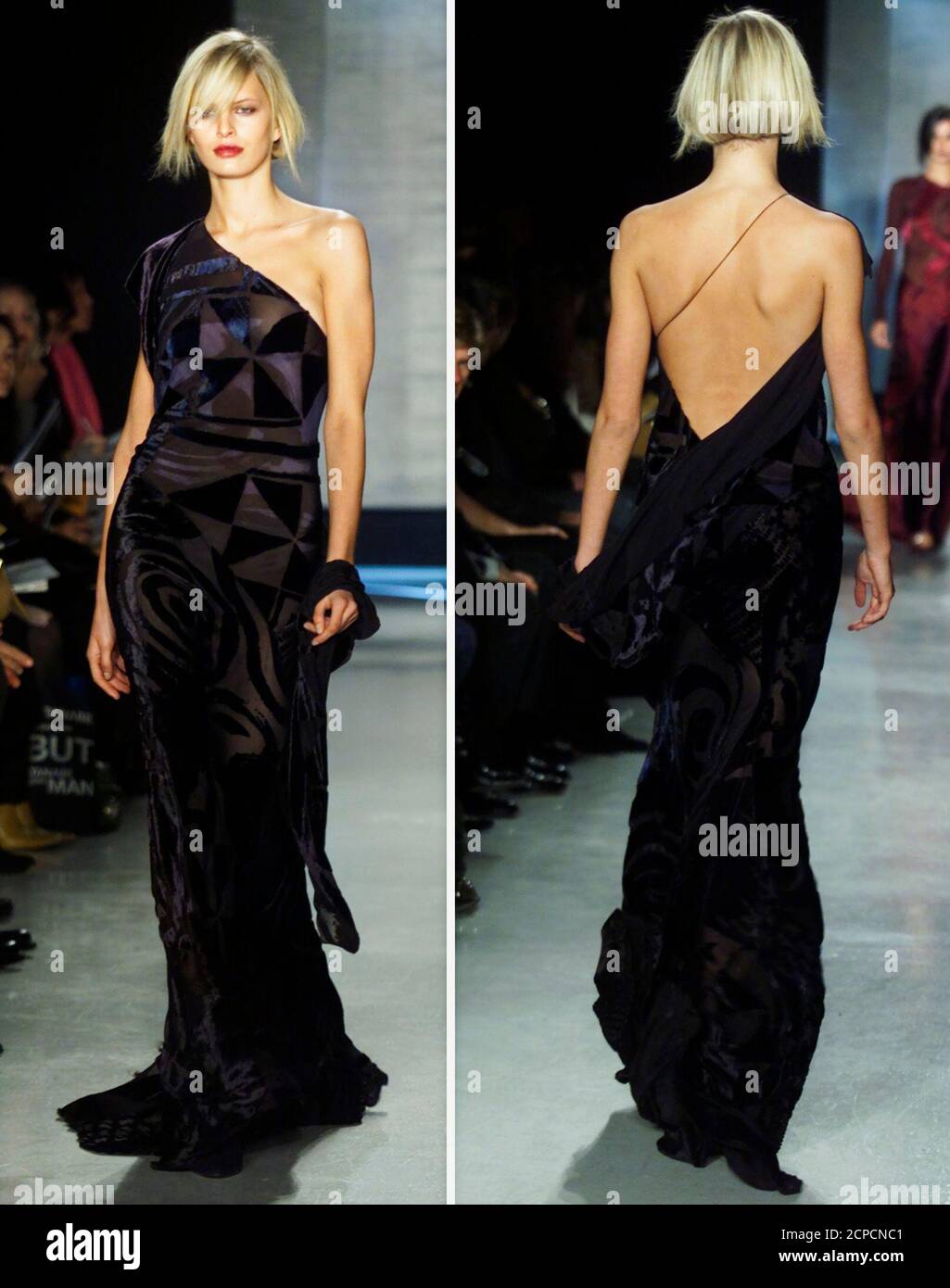 Karolina shows both sides as she wears a black devore velvet deco print floor length dress at Donna Karan's fall and winter fashion show in New York, February 15, 2002. REUTERS/Ray Stubblebine  RFS/HK Stock Photo
