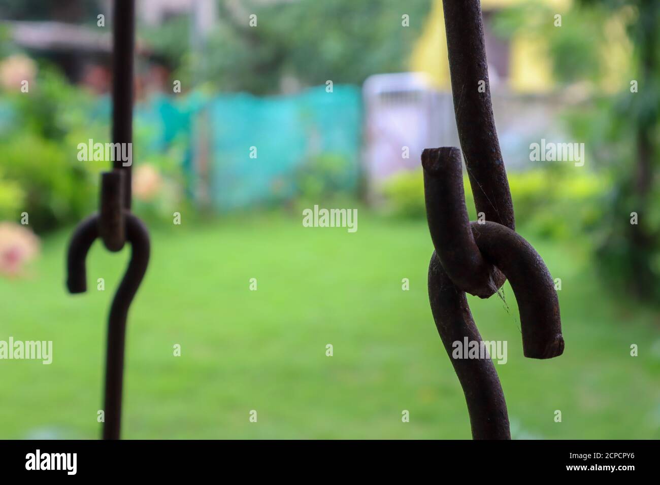 Rusted metallic chains holding together. Swing metal chain Links