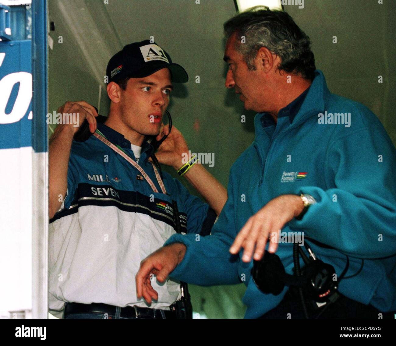 Austrian Formula One driver Alexander Wurz (L) talks to Flavio Briatore of Benetton  Renault in the Paddock area of the Austrian Grand Prix, September 19.  Briatore announced on Friday, that Wurz will