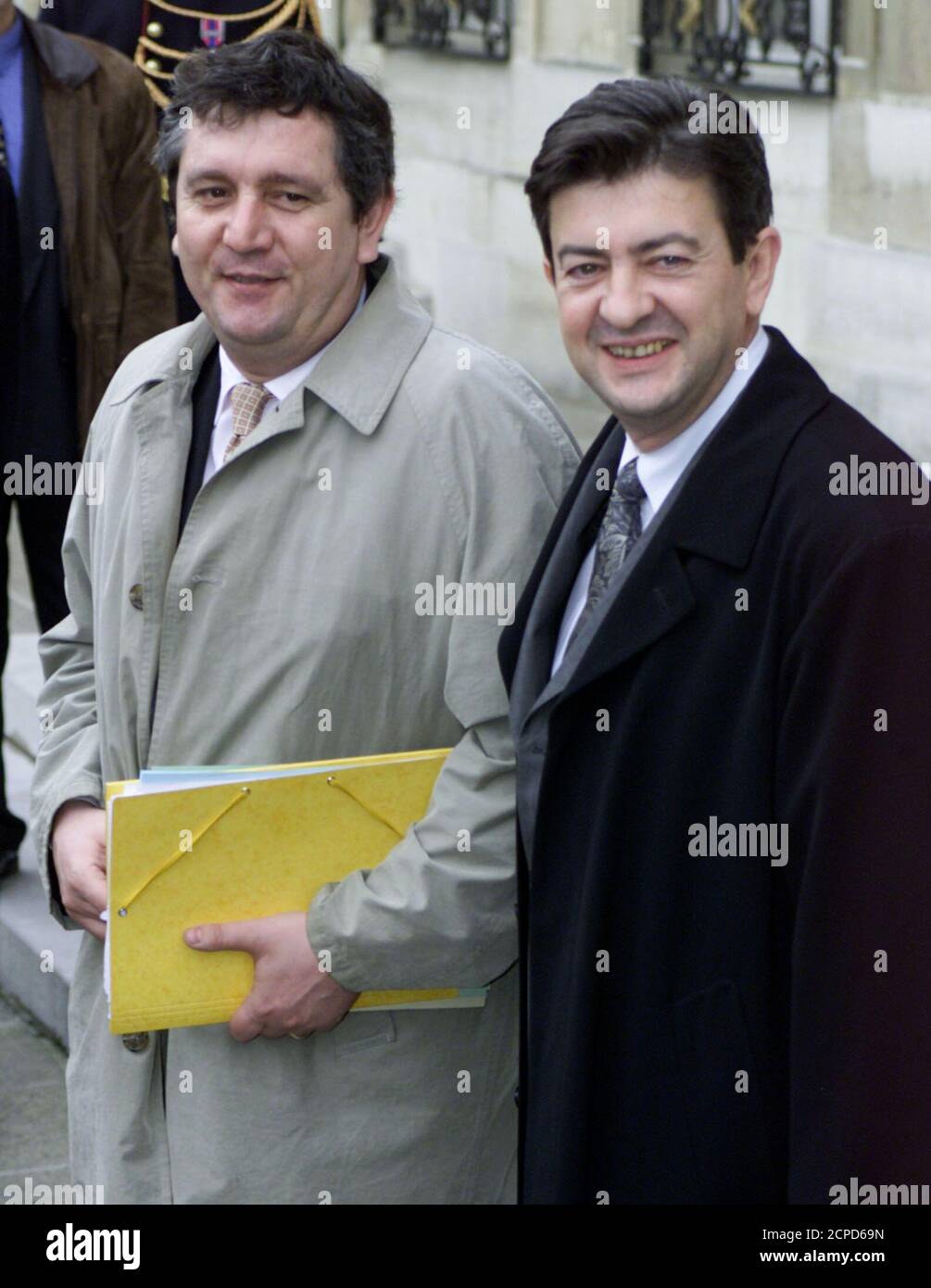 Newly appointed Economic Solidarity Secretary of State Guy Hascoet (L) and Vocational Training Delegate Minister Jean-Luc Melenchon leave the weekly ministers cabinet at the Elysee Palace March 29. Prime Minister Lionel Jospin carried out a cabinet reshuffle on Monday to give his left-wing government more strength to push for reforms.  JD/ Stock Photo