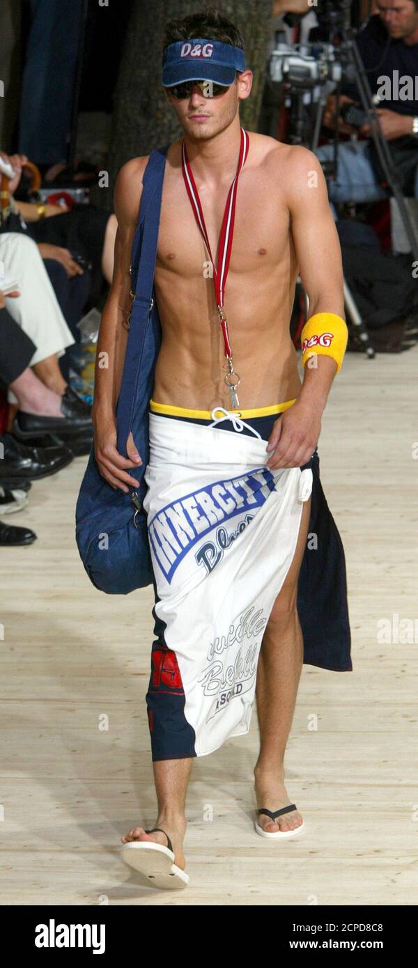 A model display beach wear for Dolce & Gabbana Spring/ Summer ready-to-wear  men's collection for 2003 in Milan June 25, 2002. The men's fashion  collection in Milan will run until June 27.