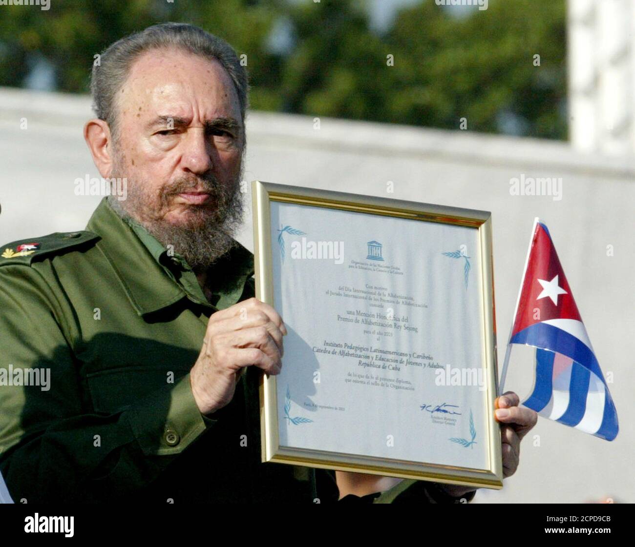 Cuban President Fidel Castro Holds The King Sejong Unesco Award He Received On Behalf Of The Cuban Alfabetization Program During A Ceremony Marking The Opening Of The School Year At Revolution Square
