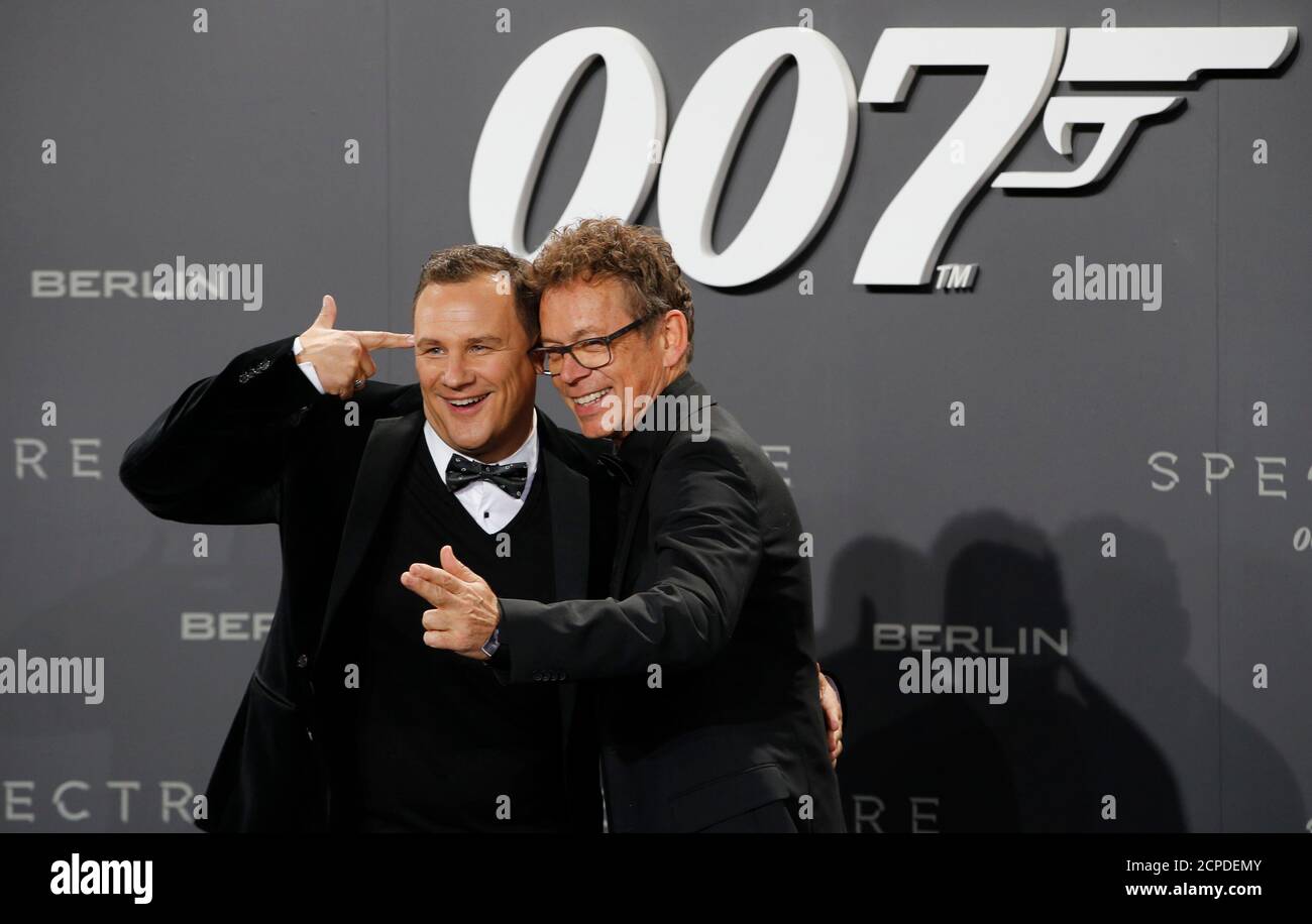 German fashion designer Guido Maria Kretschmer (L) and his husband Frank Mutters pose on the red carpet at the German premiere of the new James Bond 007 film 'Spectre' in Berlin, Germany, October 28, 2015. REUTERS/Fabrizio Bensch Stock Photo