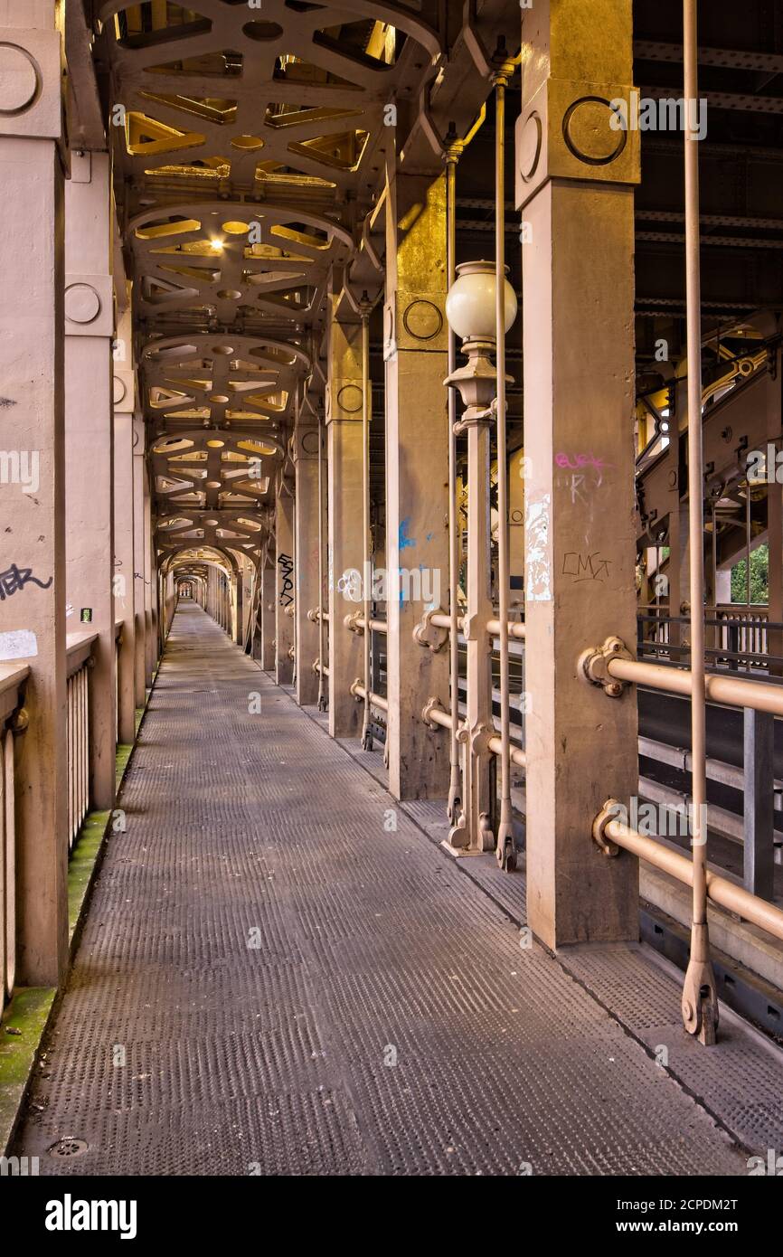 The structural ironwork of the landmark High Level Bridge and its pathway joining Newcastle and Gateshead in Tyne and Wear, North-East England. Stock Photo