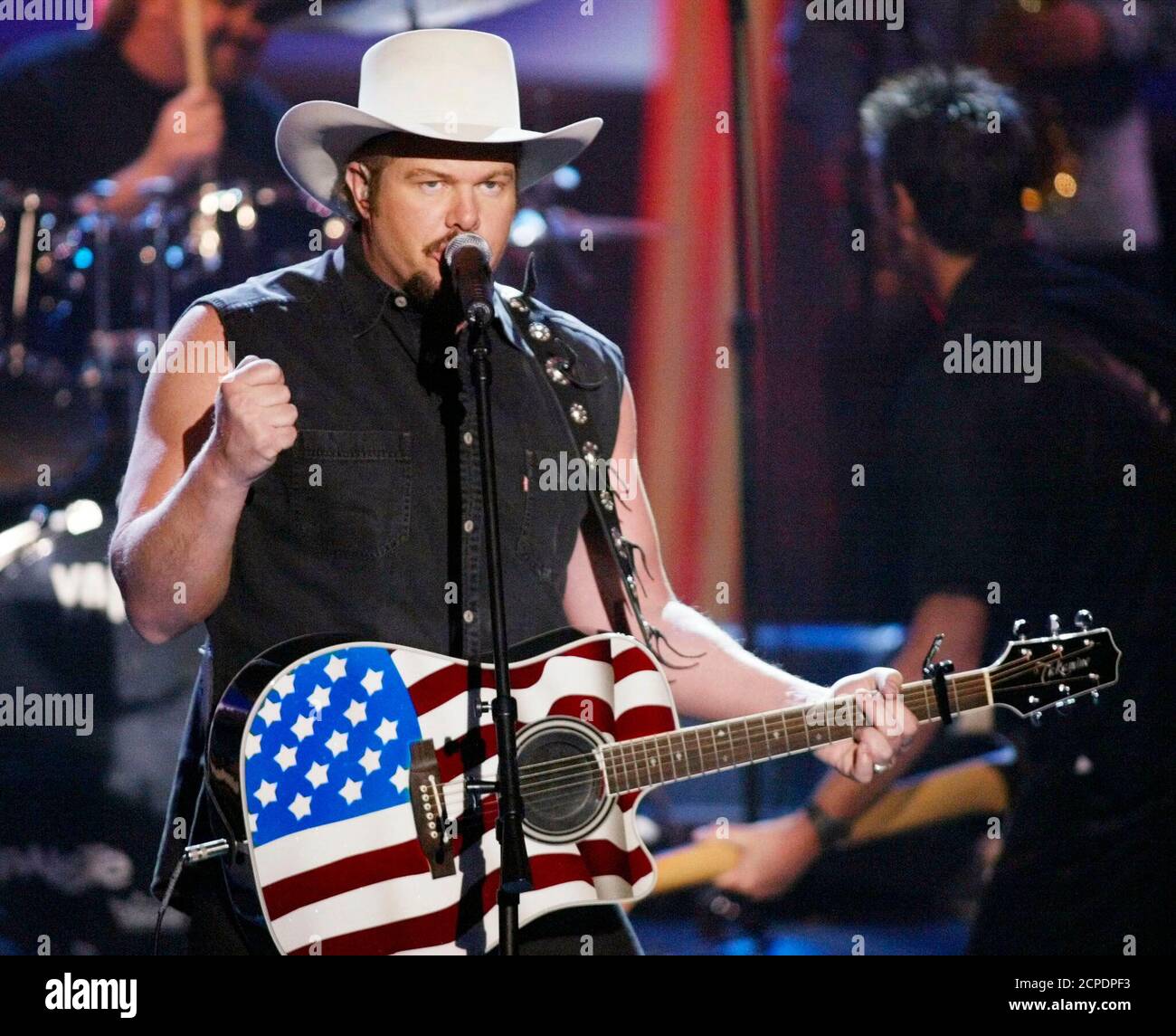 Country singer Toby Keith topped the U.S. pop charts July 2002 with his new featuring a controversial song celebrating the U.S. bombing of Afghanistan, "Courtesy of the Red, White and