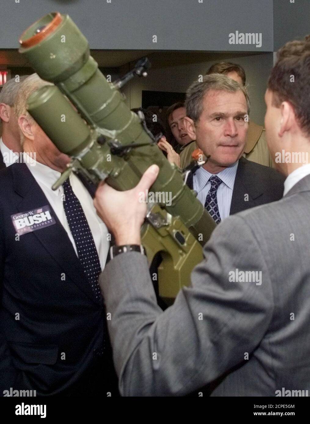 Republican Presidential Candidate George W. Bush Looks At A Shoulder  Mounted Surface-To-Air Missile Launcher At The Lockheed Sanders Jamming Lab  January 27. Lockheed Sanders Designs Equipment To Jam The Homing Devices In