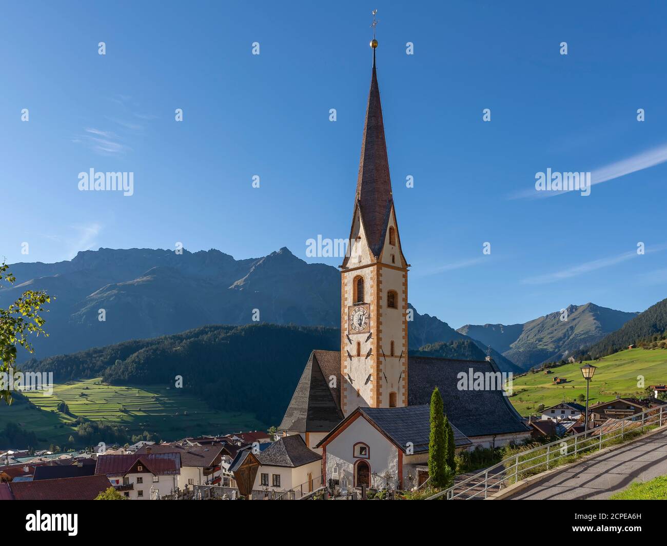 The historic center and parish church of Nauders in the Austrian Tyrol, near the border with Italy Stock Photo