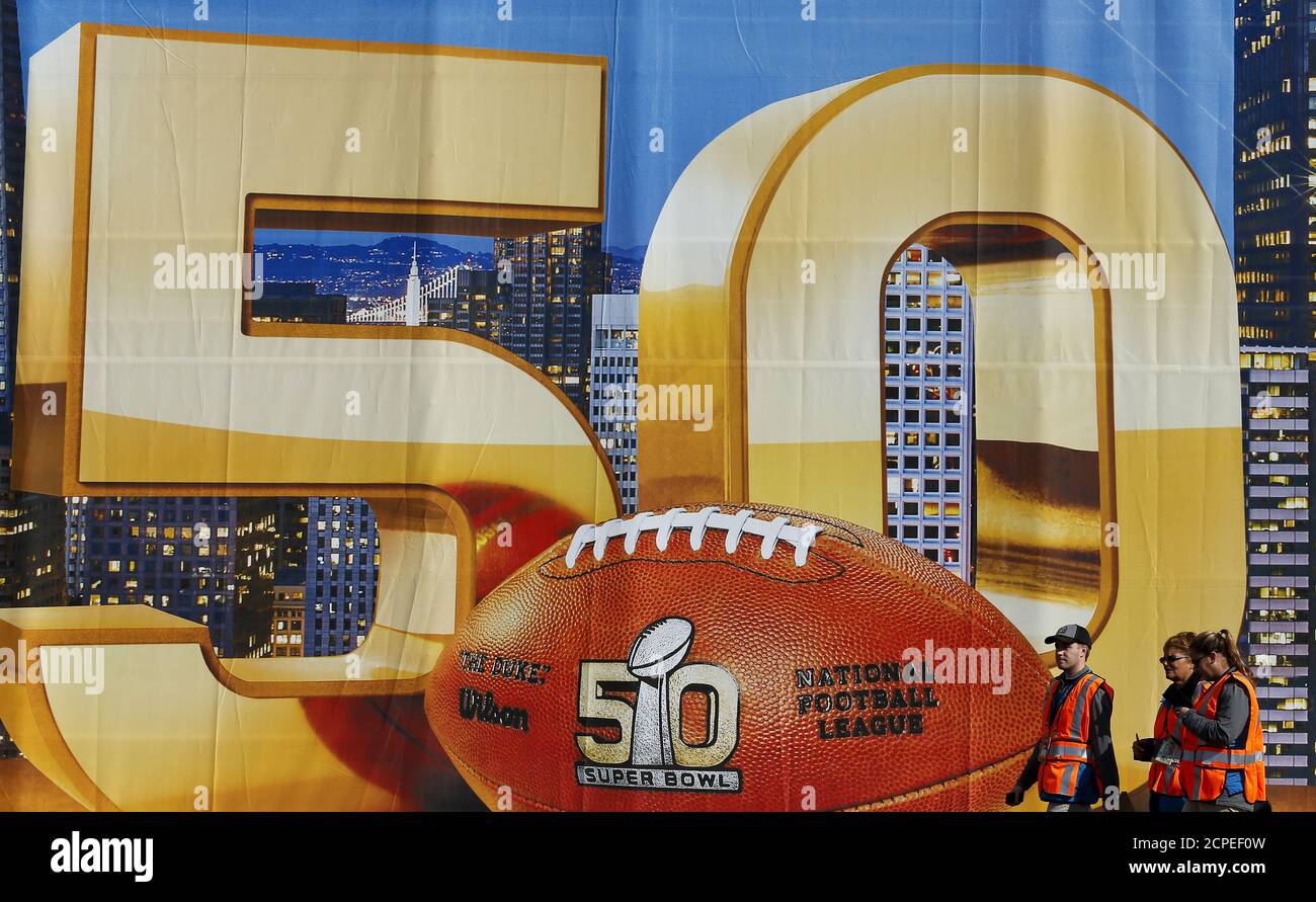 Workers prepare for NFL Super Bowl 50 outside Levi's Stadium in Santa Clara, California, United States, February 6, 2016. REUTERS/Mike Blake Stock Photo