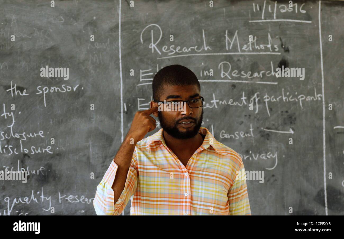 Said Omar, a lecturer at the Garissa University College, teaches third-year students as they return to the campus in Kenya's northeast town of Garissa, January 11, 2016. The campus reopened today nine months after an attack by Somalia-based al-Qaeda linked al-Shabaab Islamist militants. REUTERS/Thomas Mukoya Stock Photo