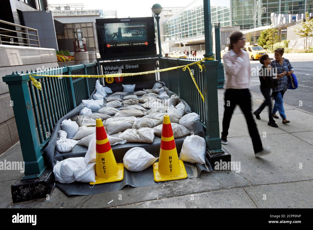 Sandbags and tarps cover the entrance to a subway station near Battery Park as New York City prepares for potential flooding as post-tropical storm Hermine stalls off the east coast of the United States, September 4, 2016.  REUTERS/Mark Kauzlarich Stock Photo