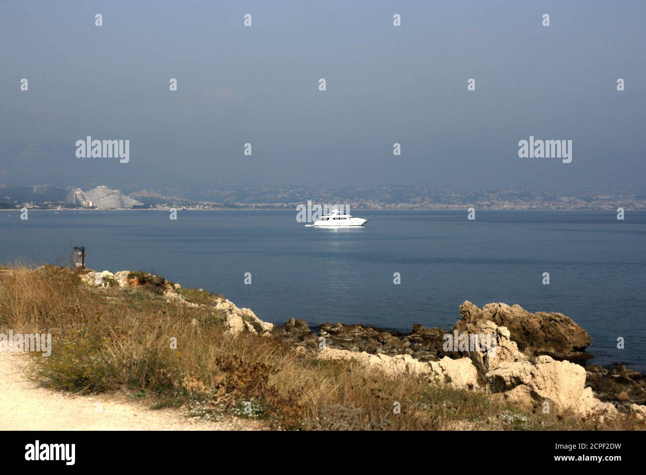 Marina Baie des Anges viewed from Antibes. Wave shaped buildings. White