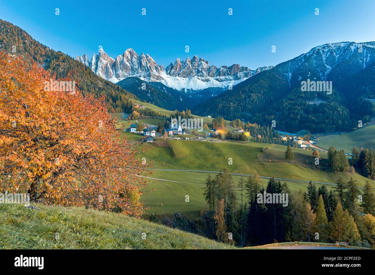 Europe, Italy, South Tyrol, Bolzano, scenary at dusk towards Santa Magdalena village with the Odle in background, classical Dolomites view Stock Photo
