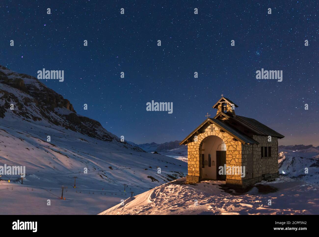 Europe, Italy, Dolomites. The alpine church at Pordoi pass at night Stock Photo
