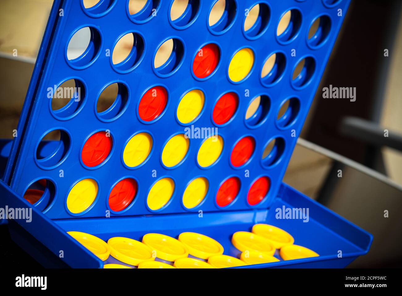 Puzzle game with red and yellow counters Stock Photo